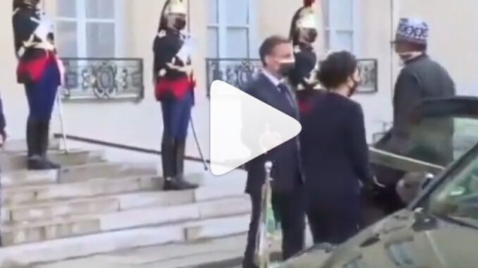 Unbothered Buhari meets French President, Emmanuel Macron and his wife Brigitte